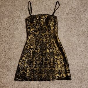 Elegant Gold and Black Mini Dress